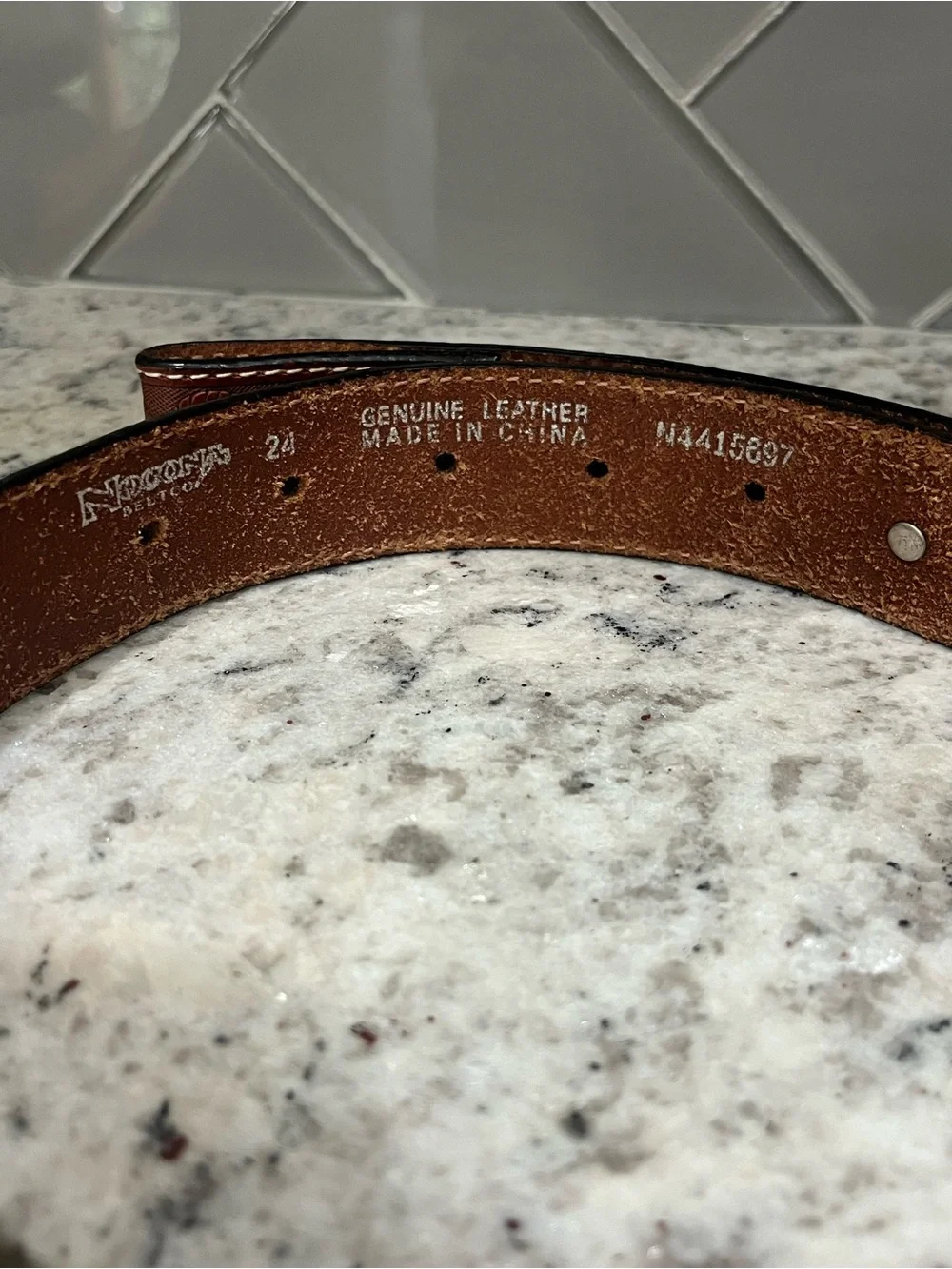 Nocona genuine leather tooled belt size 24- measures 28 3/4”
